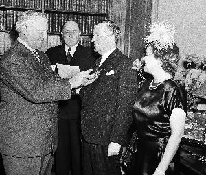 Sir William Stephenson receiving Medal for Merit