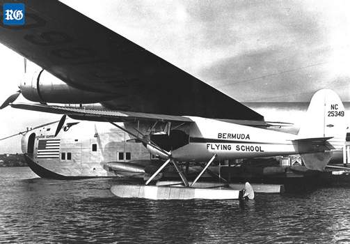 Bermuda Flying School Luscombe parked near a PAA plane